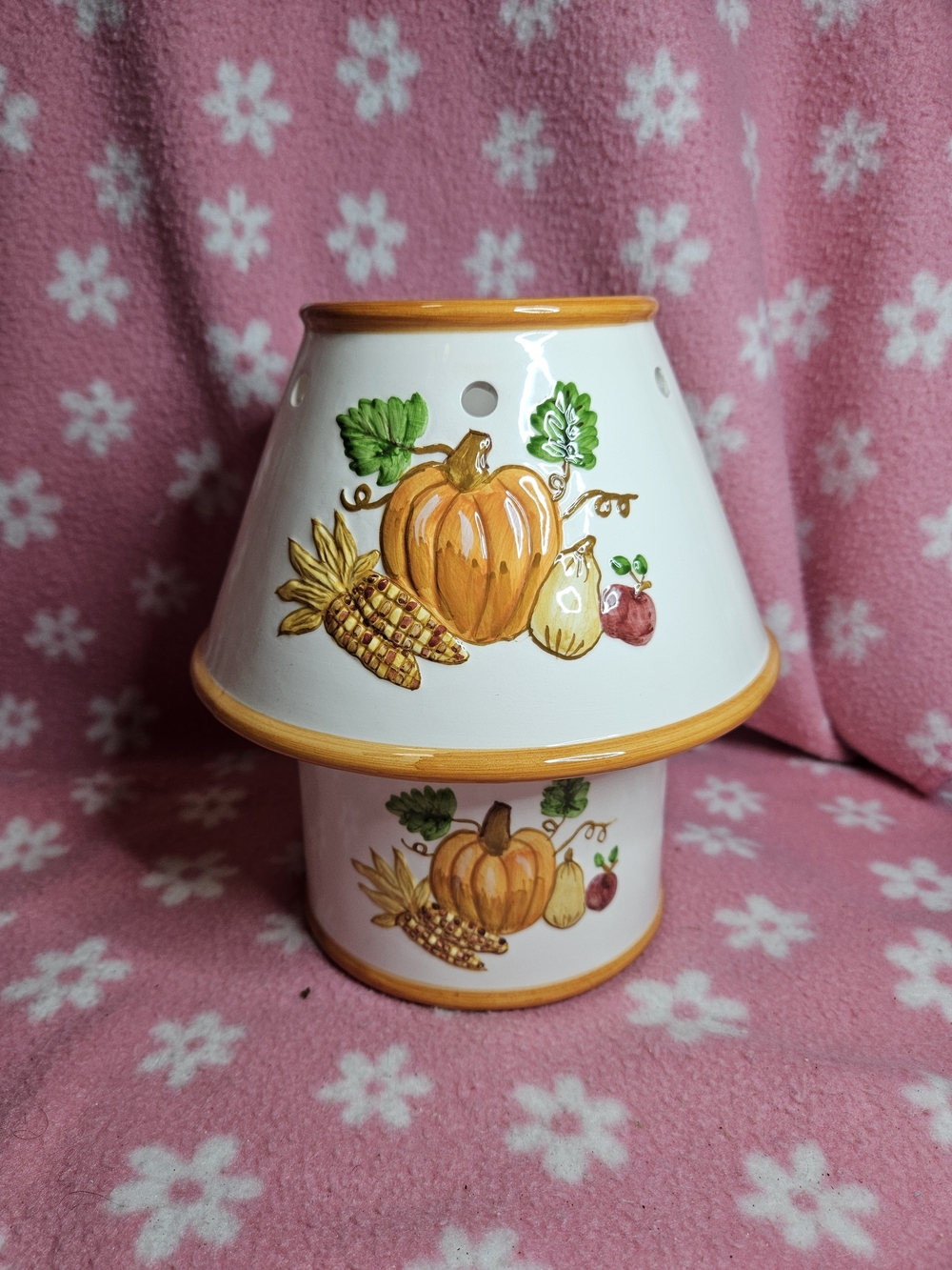 ceramic fall-themed jar candle holder and shade decorated with hand-painted pump